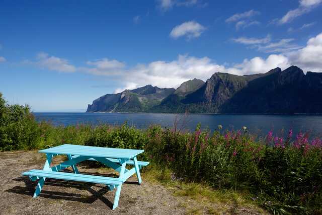 Picnic Table Overlooking Mountains and Sea in Senja Norway